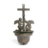 A BRONZE HOLY WATER STOUP ITALIAN OR SPANISH the Corpus Christi backplate with two attendant