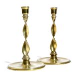 A PAIR OF BRASS CANDLESTICKS PROBABLY LATE 18TH / EARLY 19TH CENTURY each with an urn shape