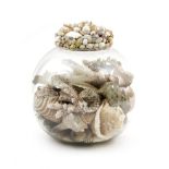 A SPANISH GLASS BALL SEASHELL DIORAMA MODERN the globular jar containing various shells and