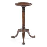 AN AMERICAN MAHOGANY TRIPOD OCCASIONAL TABLE 18TH CENTURY the dished top on a turned stem and lappet
