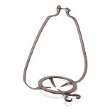 A WROUGHT IRON POT HANGER 17TH CENTURY of open form, with four prongs 49cm high, 43.5cm wide
