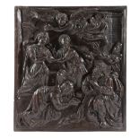 A NETHERLANDISH RELIEF CARVED OAK PANEL EARLY 17TH CENTURY depicting the Annunciation of the