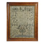A GEORGE IV NEEDLEWORK SAMPLER BY ELIZA KING worked with a cottage, figures, trees, urns of flowers,