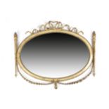 A GILT COMPOSITION OVAL WALL MIRROR IN ADAM STYLE LATE 19TH / EARLY 20TH CENTURY the bevelled