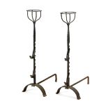A PAIR OF WROUGHT IRON ANDIRONS 18TH CENTURY each with bottle holder tops, the stems with adjustable