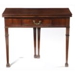 A GEORGE III MAHOGANY CARD TABLE C.1760 the fold-over top with a moulded edge revealing a baize