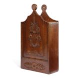 A FRENCH PROVINCIAL WALNUT CANDLE BOX LATE 18TH / EARLY 19TH CENTURY the sliding cover carved with