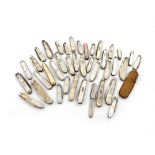 A collection of antique silver and mother-of-pearl folding fruit knives, various dates and makers,