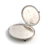 A pair of George III silver salvers, by John Scofield, London 1786, oval form, beaded crests, the
