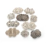 A collection of ten silver nurse's buckles, various dates and makers, including: a late-Victorian