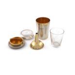 A travelling silver beaker set, by Charles Dumenil, London 1906, comprising a beaker and cover