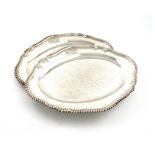 A pair of George II silver meat platters, by William Cripps, London 1754, shaped oval form,