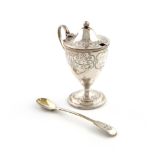 A George III silver mustard pot, by Peterson and Podio, London 1787, vase form, engraved scroll