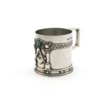 By Amy Stewart, an Arts and Crafts silver Masonic mug, Chester 1921, cylindrical form, spot-hammered