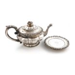 λA George IV silver teapot and associated stand, by Fentem, Webster & Danby, Sheffield 1925, the