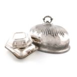 A pair of late-Victorian electroplated graduated meat dish covers, circa 1900, oval domed form,