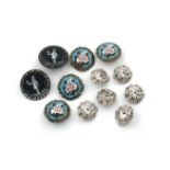 A small collection of buttons, comprising: a pair of French enamelled buttons on steel backs,