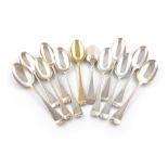 A collection of twelve antique silver and silver-gilt Hanoverian pattern tablespoons, various