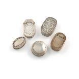 A collection of five antique silver patch boxes, various dates and makers, including: one of rounded