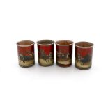 A matched set of four Russian painted silver-gilt vodka cups, maker's mark of BK, one with mark of