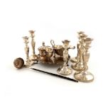 λA mixed lot of silver items, various dates and makers, comprising: a set of four candlesticks