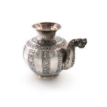 An Indian silver Lota jug, baluster form, with alternated panels of chased foliate and plain