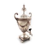 A George III old Sheffield plated tea urn, unmarked circa 1790, urn form, flying scroll handles,