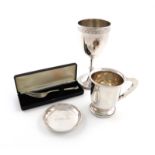 A mixed lot of silver items, various dates and makers, comprising: a Victorian goblet, by Robert