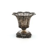 A Turkish silver basket tapering circular form, pierced with foliate scroll decoration, on a