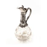 A Victorian silver-mounted cut glass claret jug, by Richards and Brown, London 1857, the faceted