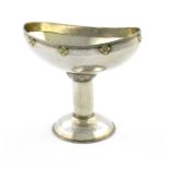 By Edward Spencer for The Artificers Guild, an Edwardian parcel-gilt silver Arts and Crafts tazza,