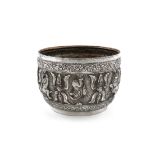 A Burmese metalware bowl, circular form, embossed with figures and foliate decoration, diameter 15.