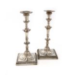 A pair of George III silver candlesticks, possibly by John Carter, London 1769, tapering baluster