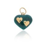 A gold heart pendant with green enamel decoration and two additional heart motifs, 2.2cm wide