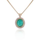 An emerald and diamond cluster pendant, the oval-shaped emerald set within a surround of round