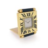 A travelling clock by Cartier, the square chapter ring with blue enamel Roman numerals, plain