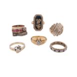 Six gem-set gold rings, including a gold ring with bands of tapered baguette diamonds and six