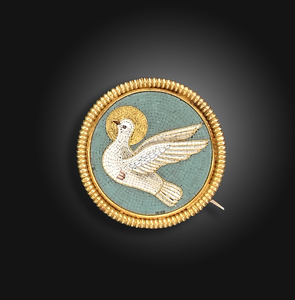 A circular micro-mosaic brooch by Castellani, c.1865, depicting the Holy Dove with gold halo, on