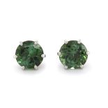 A pair of green tourmaline stud earrings, the circular-cut tourmalines weigh 7.44cts in total,