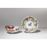 TWO JAPANESE IMARI BOWLS EDO PERIOD, 18TH CENTURY The first with a shallow body decorated in