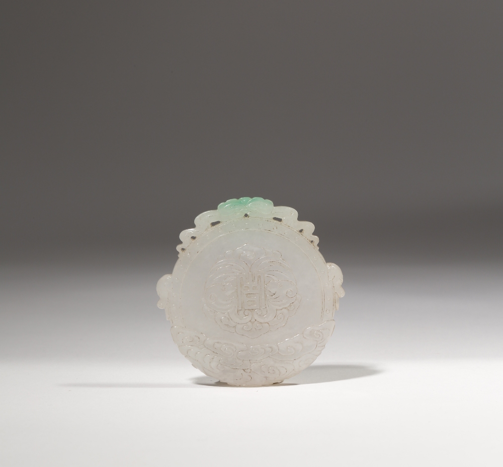 A CHINESE APPLE GREEN JADEITE CIRCULAR PENDANT LATE QING DYNASTY Carved to one side with a boy - Image 2 of 2