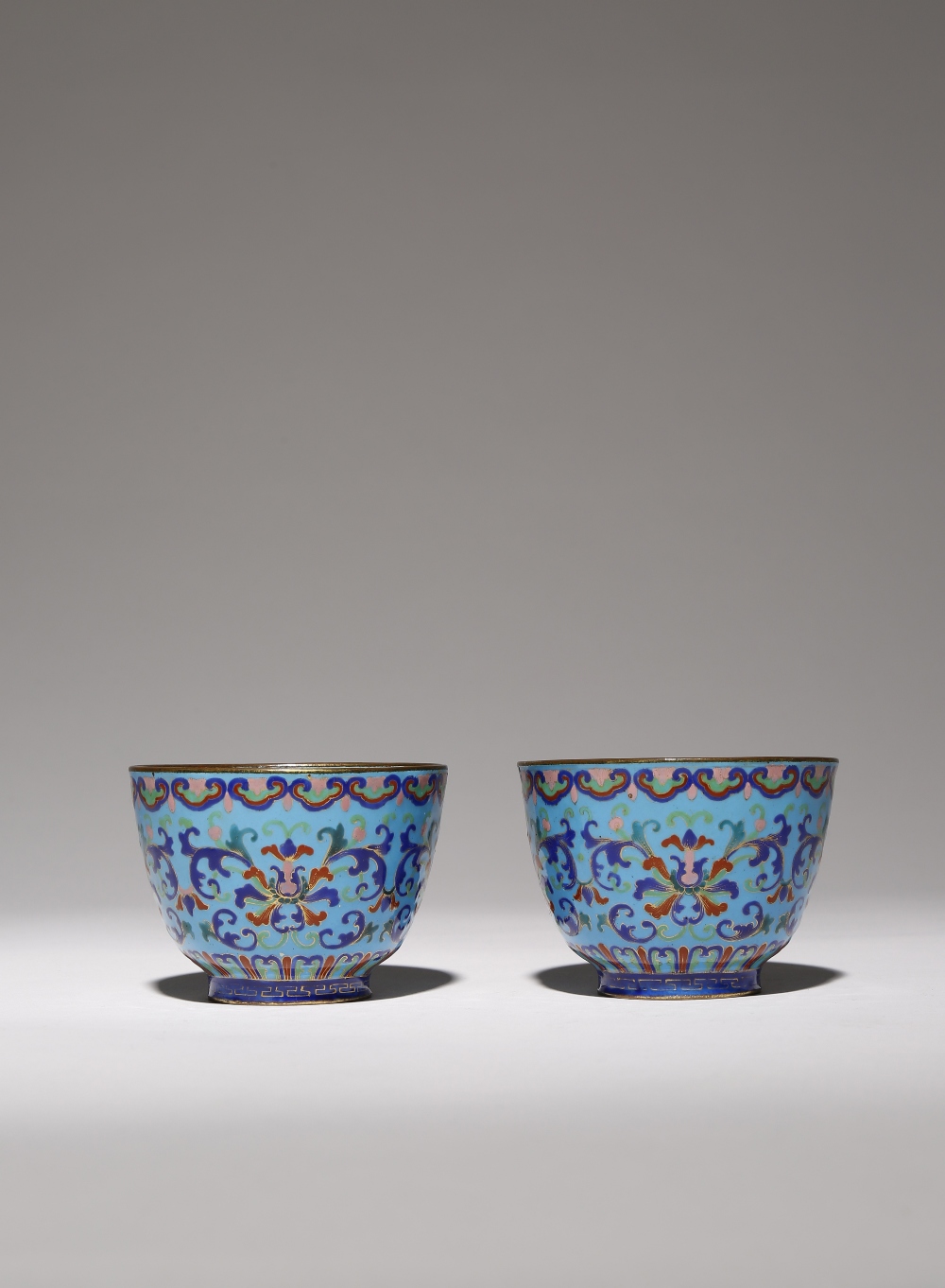 A PAIR OF CHINESE CANTON ENAMEL 'LOTUS' BOWLS 19TH CENTURY Each decorated to the exterior with