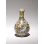 A CHINESE FAMILLE ROSE YELLOW-GROUND GARLIC-MOUTH BOTTLE VASE REPUBLIC PERIOD OR LATER The pear-