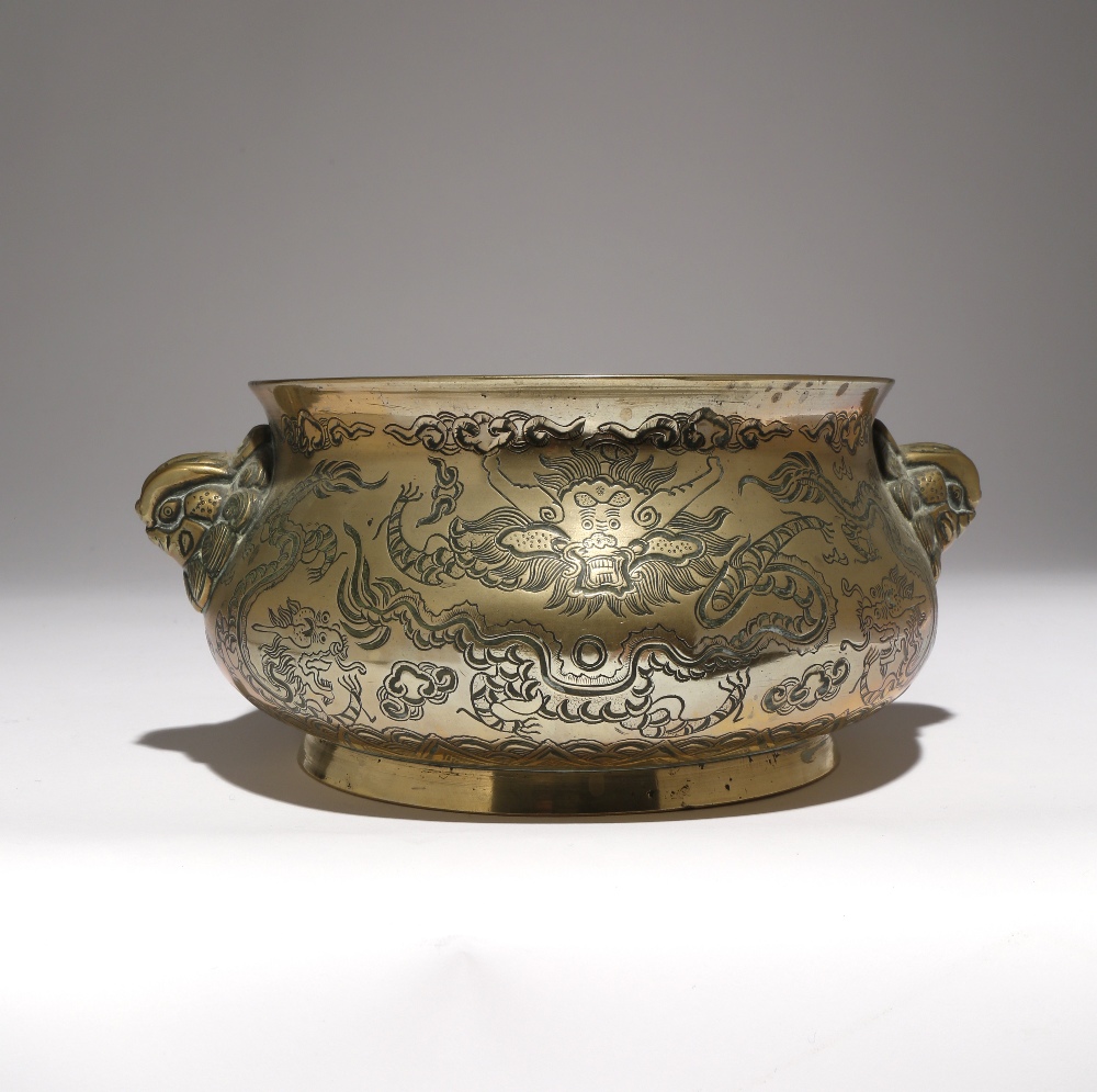 A CHINESE BRONZE 'FIVE DRAGON' INCENSE BURNER LATE QING DYNASTY The bombé-shaped body engraved to
