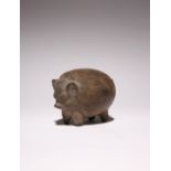 A JAVANESE POTTERY PIGGY BANK C.15TH CENTURY The rotund animal modelled standing on four tapering