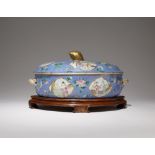 A CHINESE FAMILLE ROSE TUREEN AND COVER 19TH CENTURY Brightly decorated in enamels and gilt with