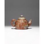 A CHINESE SOAPSTONE TEAPOT AND COVER QING DYNASTY Decorated in low relief with two cartouches