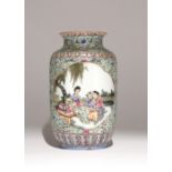 A CHINESE FAMILLE ROSE GREEN-GROUND VASE REPUBLIC PERIOD Painted with two quatrefoil cartouches