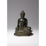 A SOUTHEAST ASIAN BRONZE FIGURE OF BUDDHA SHAKYAMUNI 19TH CENTURY He sits upon a beaded lotus throne