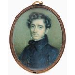 λFrench School Early 19th Century Portrait miniature of a gentleman in a black coat Oval, in a